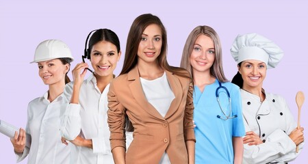 Young Women of different professions posing on background