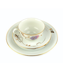 Vintage porcelain cup and saucer isolated on white.