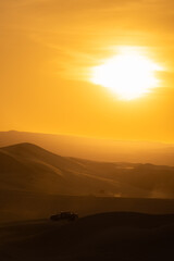 Obraz premium Atardecer, emociones y Tranquilidad en las Dunas del desierto de Huacachina Perú