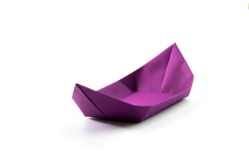 Paper colored boat isolated on white background. origami crafts. transport concept. origami.