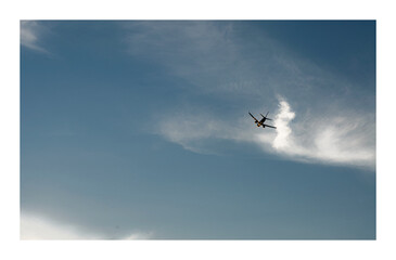 flying plane in the sky