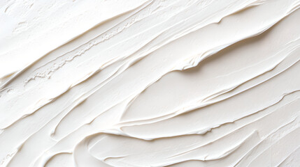 Close up detailed photo of a thick textured white cream.
