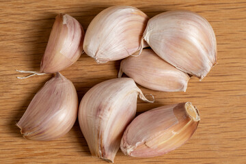 Detail of purple garlic on top of a board