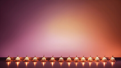 Obraz premium Festive display of decorative lamps arranged in a row on a table with a warm orange and purple gradient background