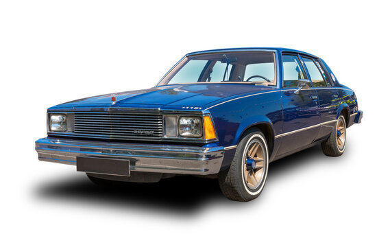Classic american car Chevrolet Malibu Classic 4 door hardtop. White background.
