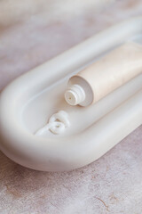 Anti-Age Face Cream in a white stone tray