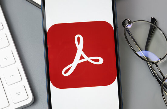 New York, USA - 30 August 2024: Acrobat Pro Logo on Phone Screen, Company Icon on Display