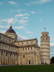 Pisa Tower with Basilica. Wide angle. Moody colors photo.