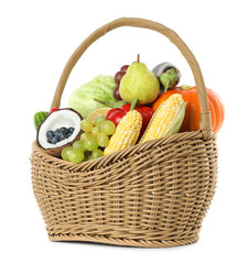 Different fresh vegetables and fruits in wicker basket isolated on white