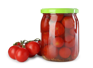 Tasty pickled tomatoes in jar and fresh ingredients isolated on white