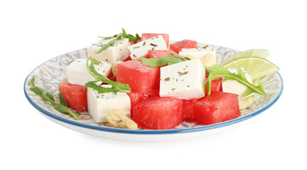 Delicious watermelon salad with feta cheese, cashew nuts and spices isolated on white