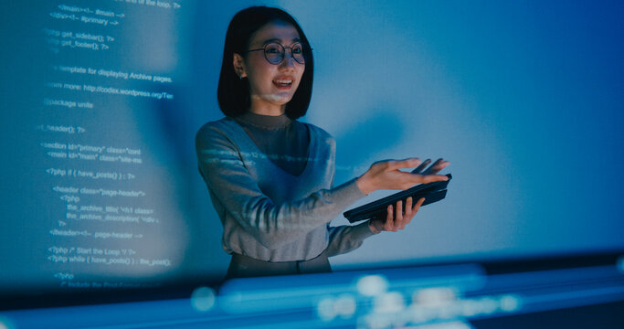 Group adult Asia female software developer mentor leader manager talk strategy plan to executive write prompt AI bot IT app program nomad, video game, designer, data center. Projecting slideshow code.