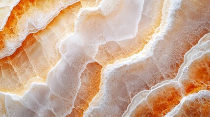  A tight shot of an artwork featuring swirling oranges and whites on its surface