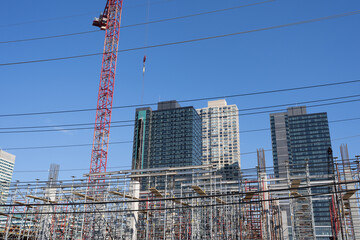 The tower crane. Tower Cranes. Construction of Skyscrapers. Tower Crane on formworks. Crane and...