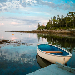 Obraz premium Sunset Reflection and Boat at Hancock Point, Maine