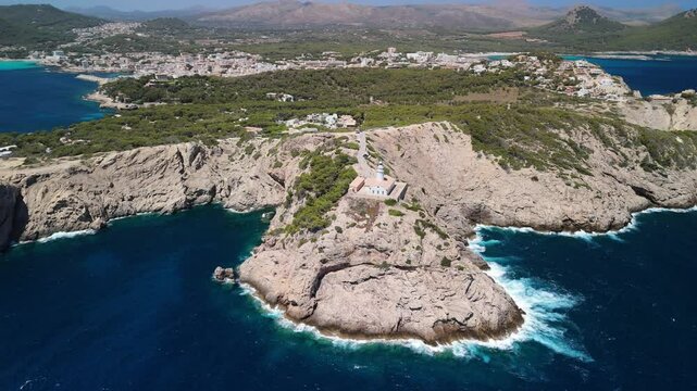 Aerial view of Capdepera lighthouse on mediterranean rocky coast, Mallorca