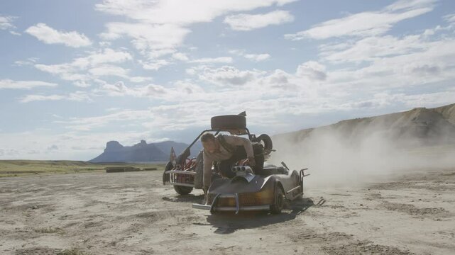 Stunt man jumping between moving karts and falling - cinematic