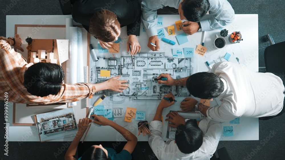 Poster top aerial view of project manager or civil engineer writing at blueprint and planning building desi