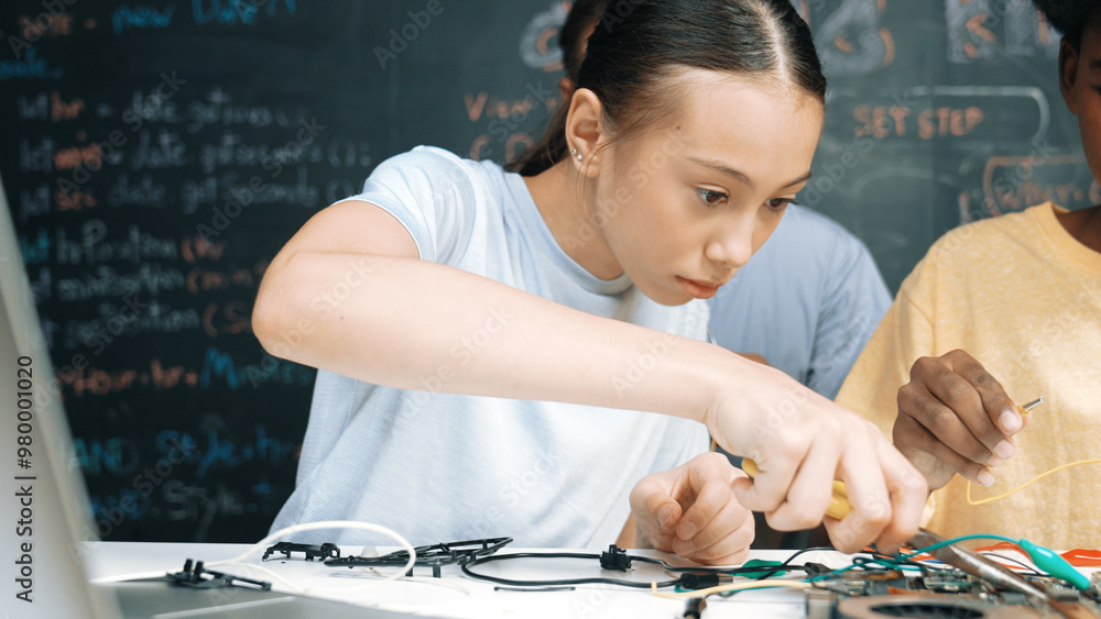 Poster happy highschool student using electronic tool fixing board while caucasian teacher help preparing c