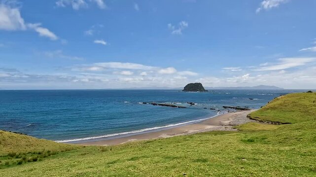 Fletcher Bay and its Rolling Hills along the remote Coromandel Coastal Walkway, Moehau Range, New Zealand