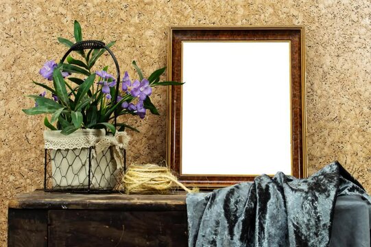 still life: empty picture frame mockup on wooden old desk table. purple flowers vase and rope and gray textile. Elegant working space, home office concept - Powered by Adobe