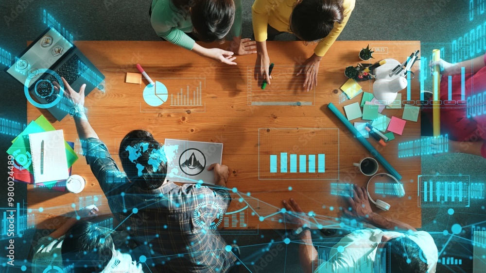 Aufkleber top view of skilled business team put graphic logo on meeting table with colorful sticky notes and s