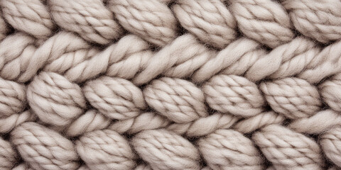 Texture of knitted textile. Woolen warm woven fabric surface in pastel color. Abstract background with copy space.