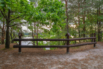 Walking along the educational path around Maziarnia Lake in Wilcza Wola, Poland