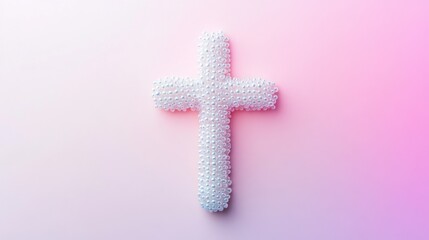 Obraz premium Cross Made of White Beads on a Pink Background. 
