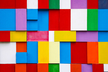 Colorful abstract  vibrant squares in various  shapes on  wall