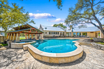 Relaxing oasis featuring a sparkling pool and beautiful outdoor area in a serene location