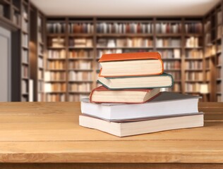 Set of reading books on table in library, education