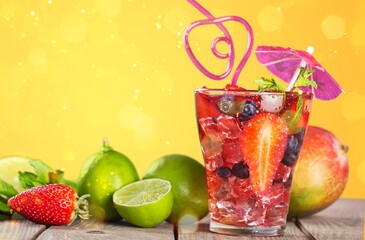 Summer cold  cocktail in glasses with fresh fruits