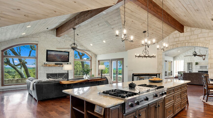 Spacious modern kitchen with rustic elements and scenic views