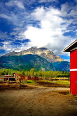 horse barn with mountains