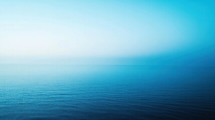 Obraz premium A soft gradient blue background transitioning from light blue at the top to deep blue at the bottom. Minimalist and serene.