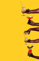 Many hands of zombies with cocktails on yellow background. Halloween celebration