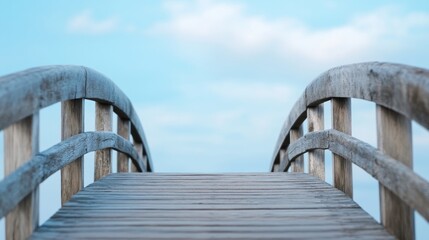 Fototapeta premium Serene Wooden Bridge Under Open Skies, a gentle wooden curve inviting exploration, symbolizing journeys and new beginnings, set against a minimalist, tranquil backdrop.