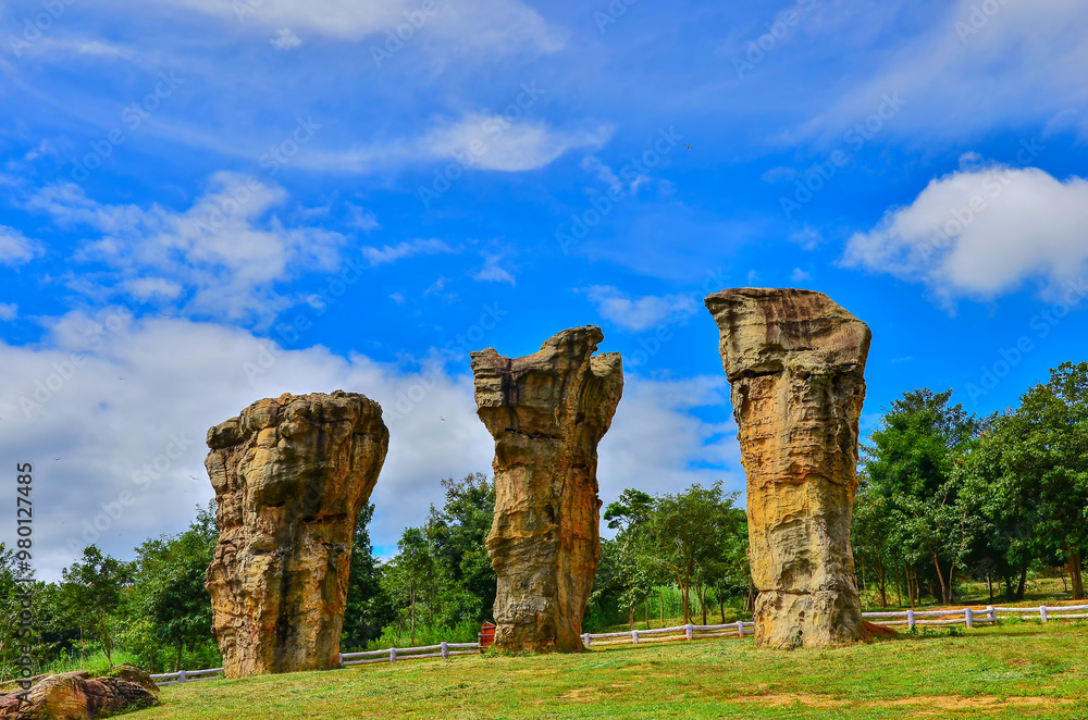 Wall mural viewpoint of white stone park, thailand's stonehenge, with large rocks scattered all over on a clear