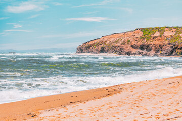 Cowell Ranch beach with ocean waves near Half Moon Bay on the California coast. Beautiful scenery, concept of rest, vacation, tourism