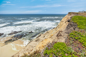 Cowell Ranch beach with ocean waves near Half Moon Bay on the California coast. Beautiful scenery, concept of rest, vacation, tourism