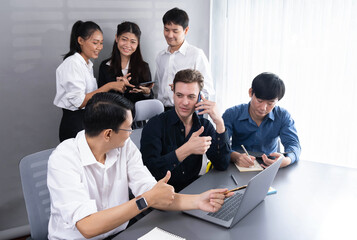 Group of diverse office worker employee working together on strategic business marketing planning in corporate office room. Positive teamwork in business workplace concept. Prudent