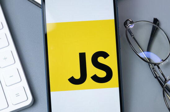 New York, USA - 30 August 2024: JavaScript Logo on Phone Screen, Company Icon on Display
