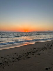 Orange sunset on the ocean beach