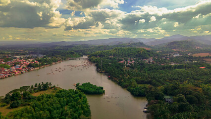 Boats and fishermen at the maragondon river cavite