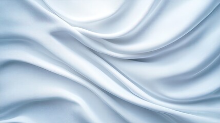 Obraz premium Elegant and smooth white silk fabric with soft folds and gentle drapes, perfect for backgrounds or textile designs.