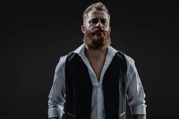 Fotobehang Kapsalon Brutal elegant bearded redhead man with red beard in formal menswear isolated on grey  © be free