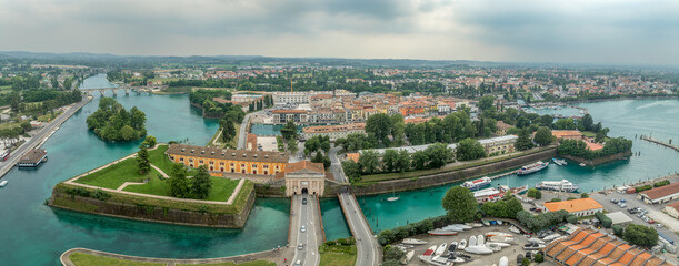 Aerial view of Perschiera del Garda island fortress on the Garda Lake Italy with large gun platform...