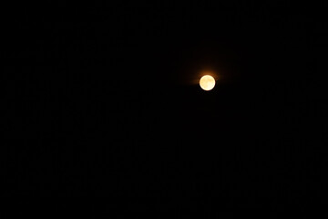 The moon in the dark sky. Lunar eclipse 2024.