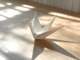 A closeup of a delicate origami crane